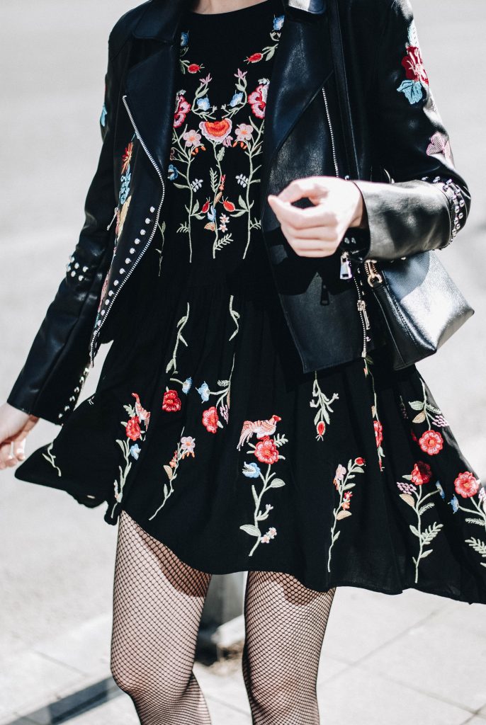 Spring fashion trends 2017 embroidered dress and leather jacket