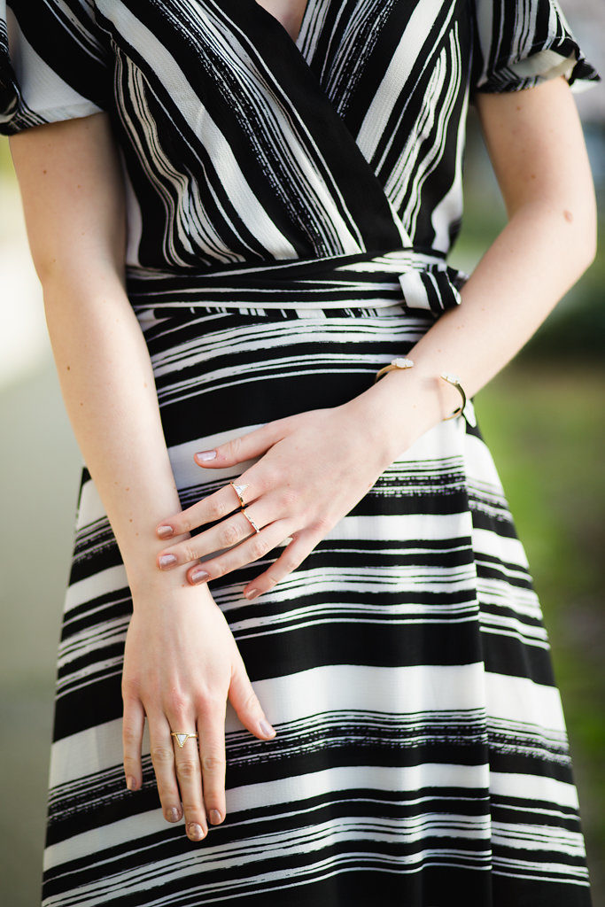 Bailey Blue Sydney striped dress with layered gold rings and kendra scott quartz bracelet