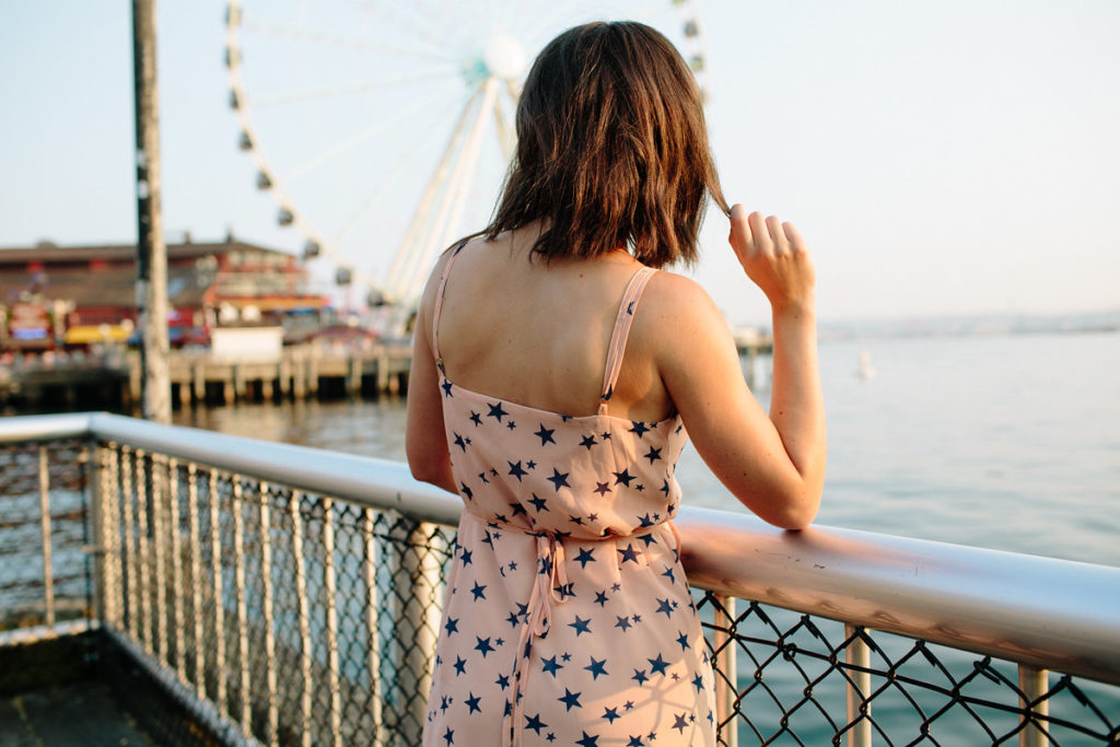 Pink wrap dress with navy blue stars fashion blogger