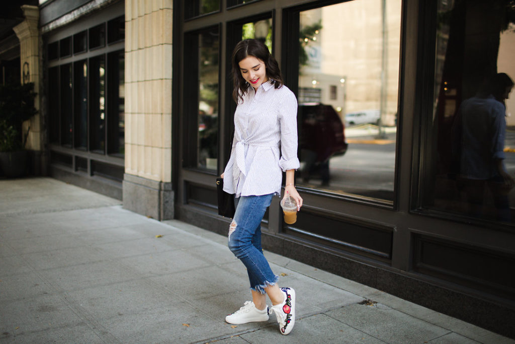 Striped collared button up blouse and embroidered white sneakers