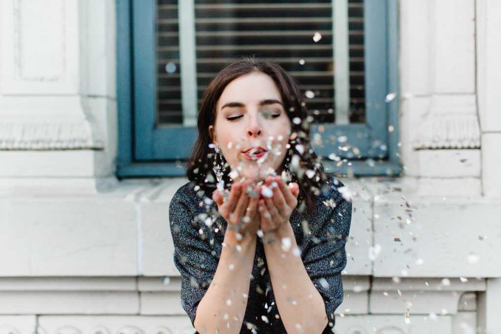 Blowing confetti and glitter photography
